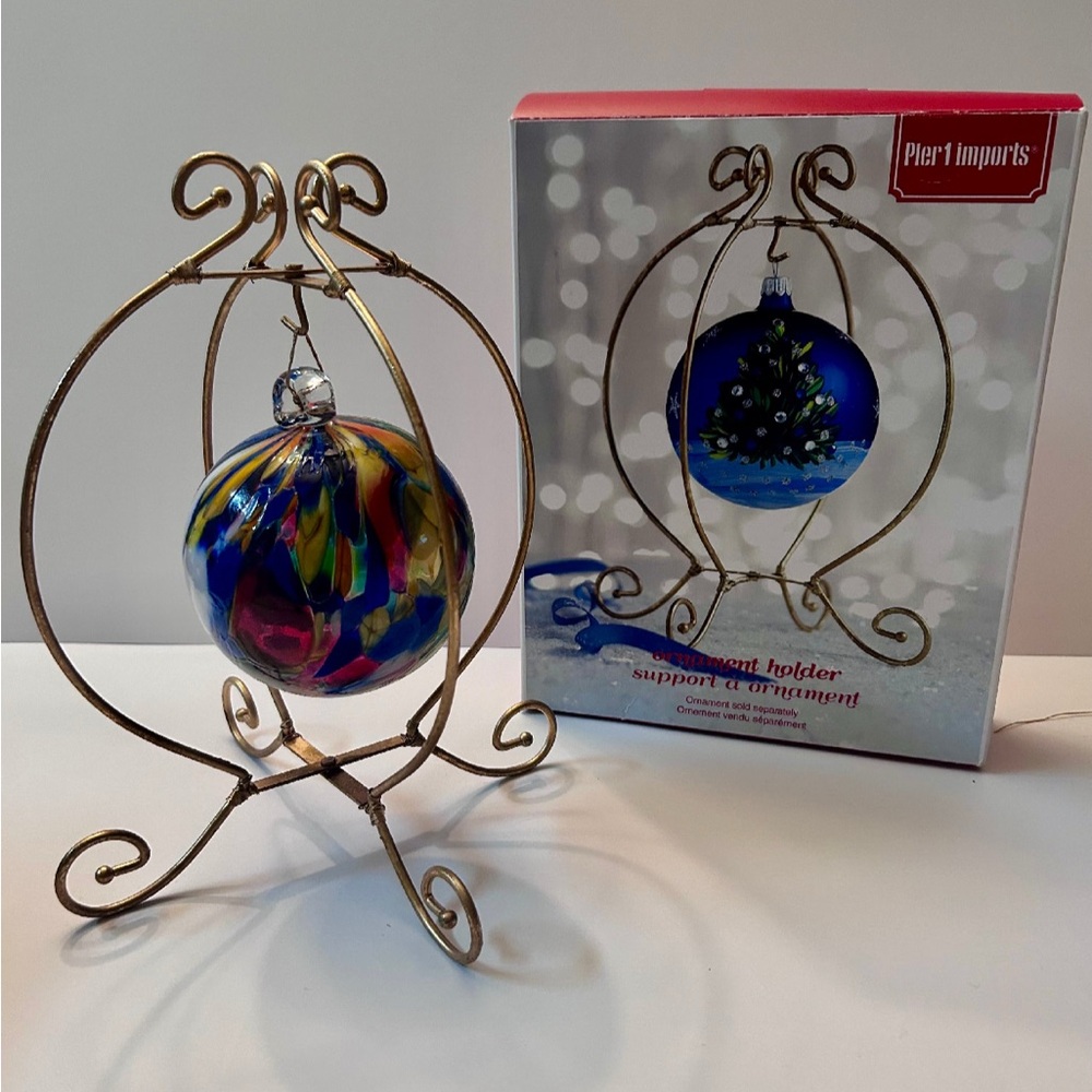 Colorful Hand-Blown Glass Art
Christmas Ornament & Pier 1
Imports Golden Stand
